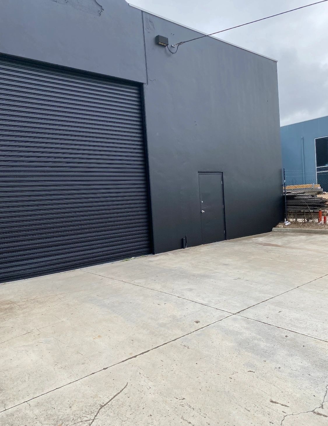 Commercial building exterior with roller door