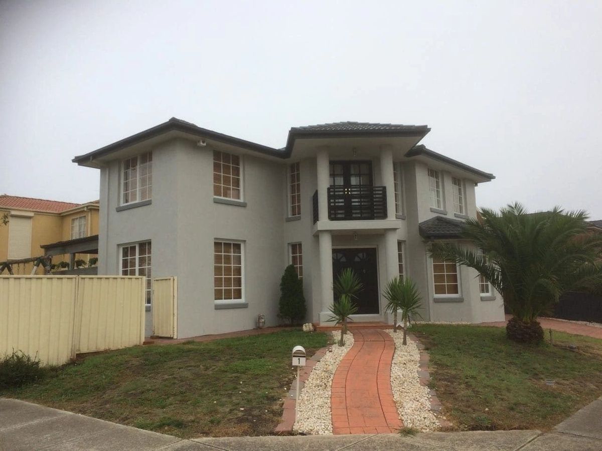 Two-storey rendered house after an exterior repaint