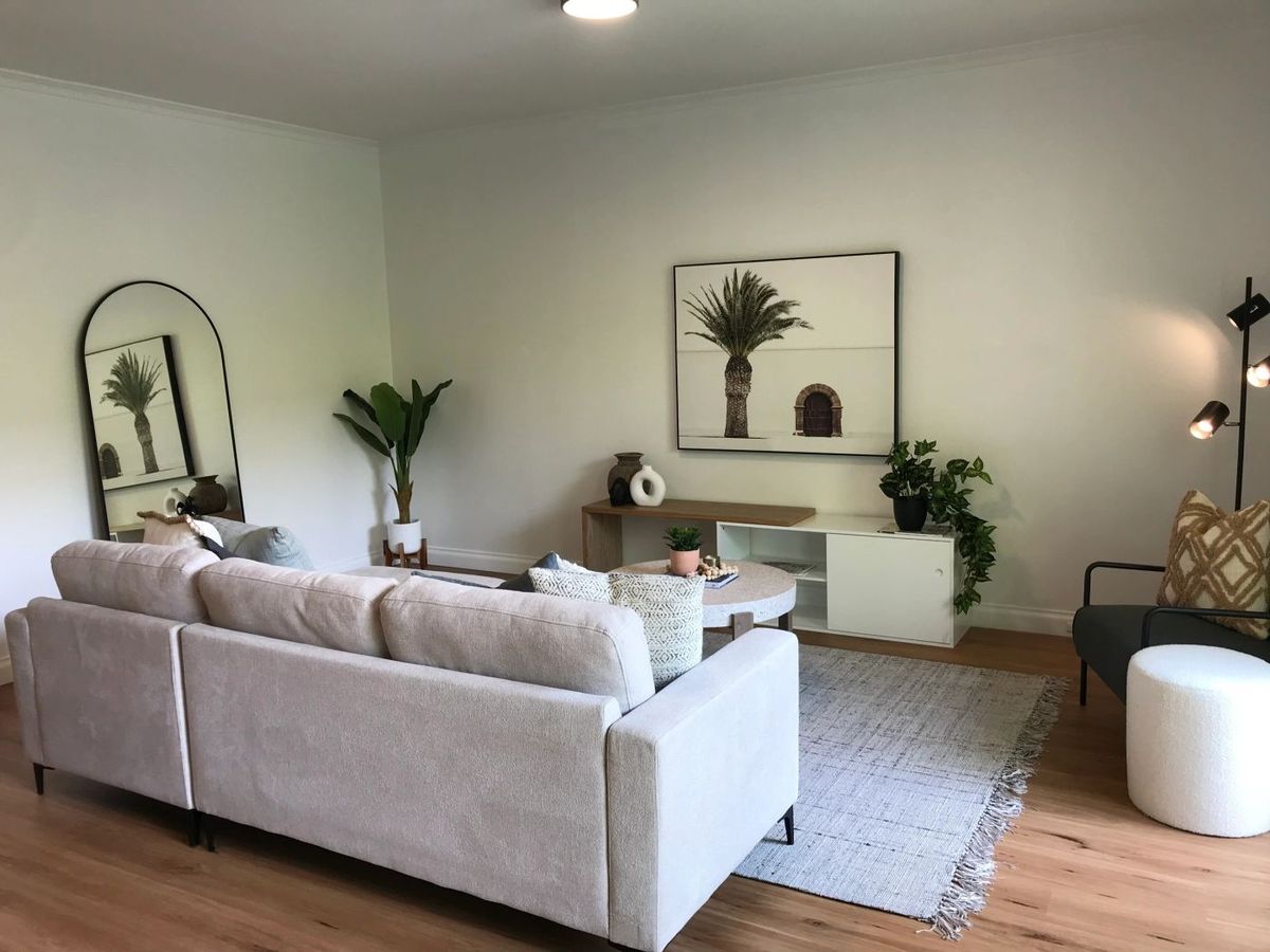 Living room finished in warm off-white